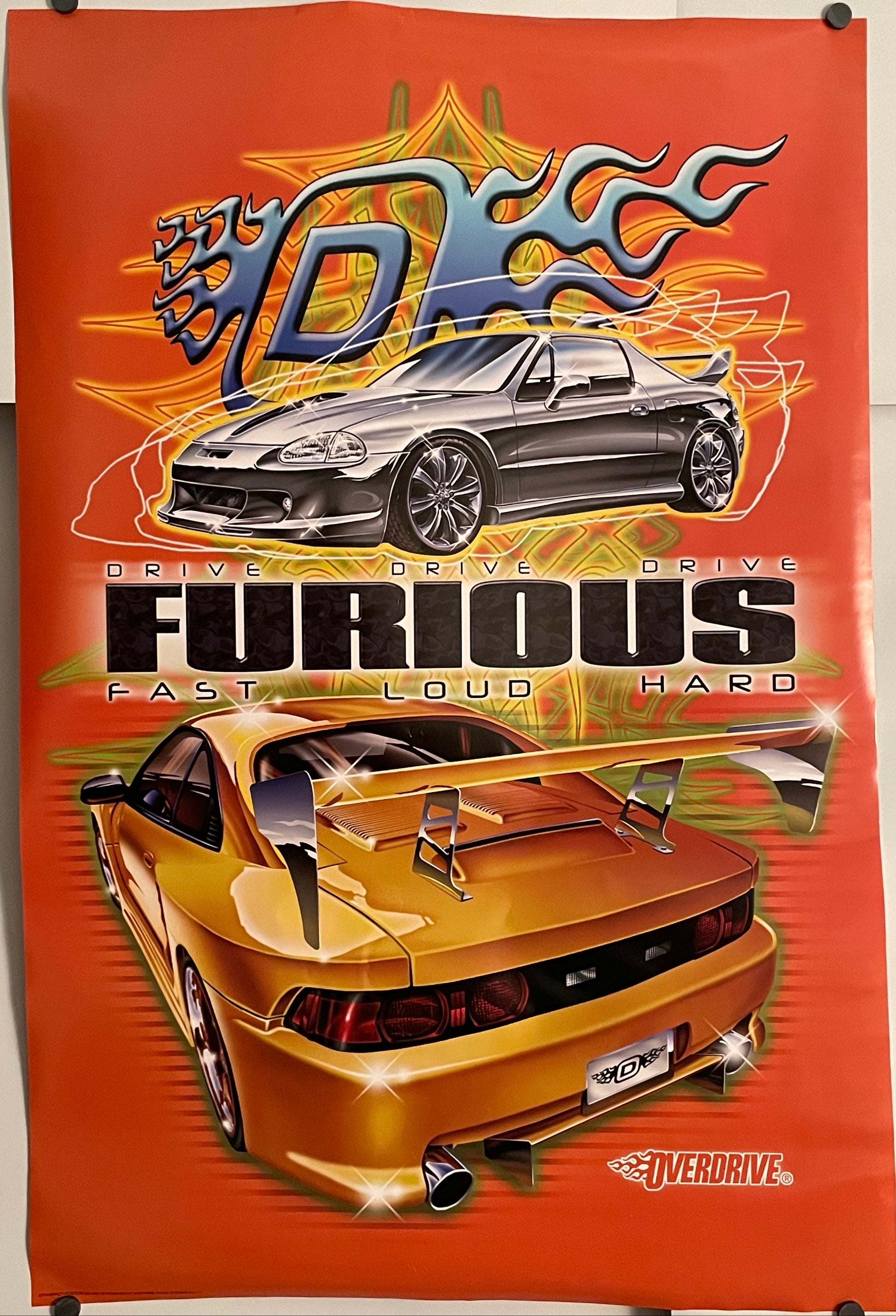 Overdrive - Furious, Drive Fast, Loud, Hard, video gaming poster, gold and silver colored sports cars against a bright orange background.